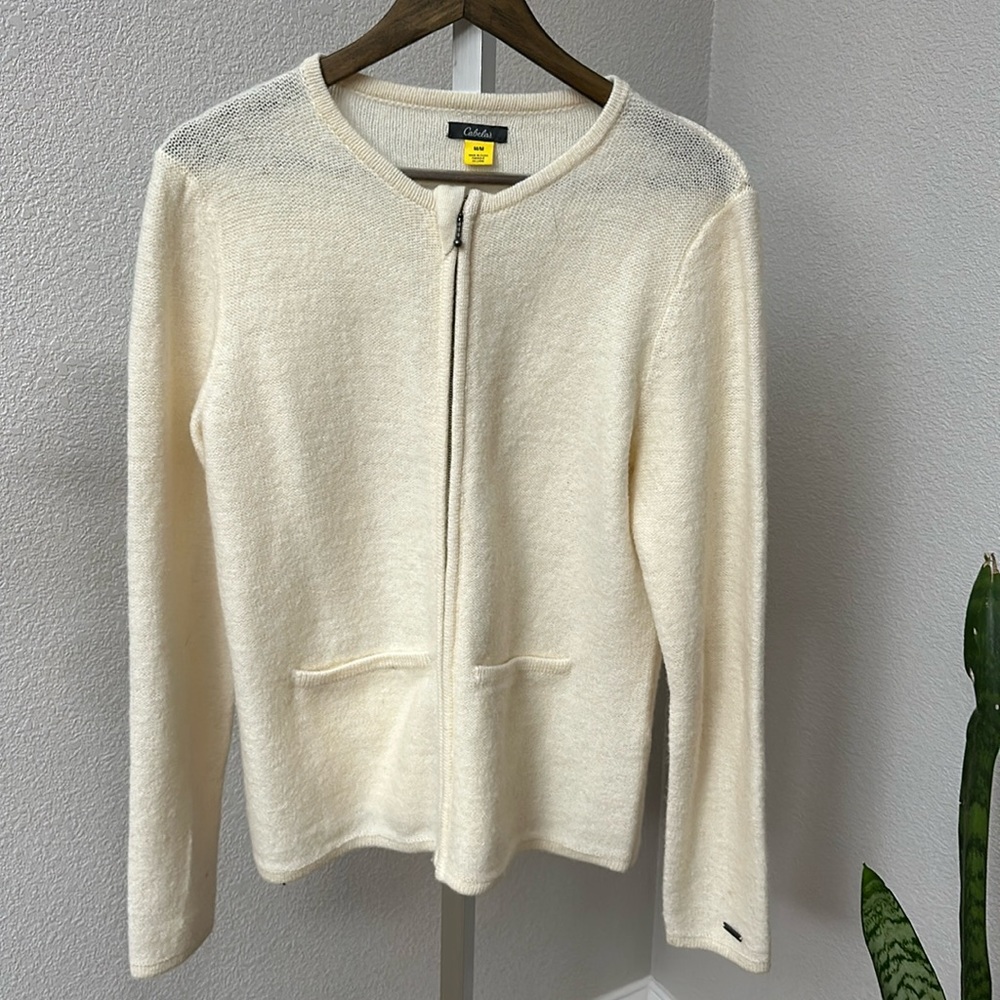 Medium cream color sweater